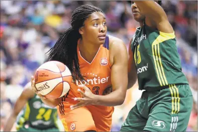  ?? Tim Clayton / Corbis via Getty Images ?? Morgan Tuck, a former UConn standout, played only 48 out of a possible 68 games over her first two WNBA seasons with the Connecticu­t Sun due to a lengthy history of knee ailments.