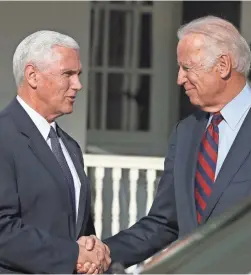  ?? WILSON / GETTY IMAGES MARK ?? Vice President Joe Biden shakes hands with Vice President-elect Mike Pence at the Naval Observator­y in Washington on Nov. 16, 2016.