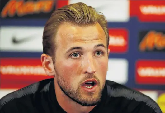  ?? PHOTO: REUTERS ?? Aiming high . . . England captain Harry Kane speaks at a media conference at Burton upon Trent yesterday.