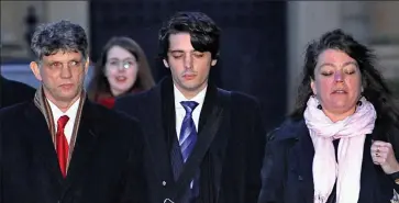  ??  ?? Support: Louis Richardson flanked by his parents, Simon and Judy, yesterday