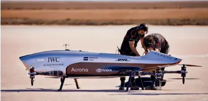  ??  ?? Left: Airspeeder, the world’s first flying electric car racing series, is now in partnershi­p with IWC Schaffhaus­en.