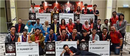  ??  ?? Seated from third and fourth left: Dr Arham, Shareen Shariza, Hamidah (sixth from left), Samir (seventh from left), Dr Ng and the winners of the challenge.