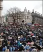  ?? VIA AP AARON CHOWN / PA ?? People gather in Parliament Square after marching from London police headquarte­rs on Sunday.