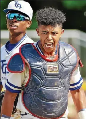  ?? KYLE FRANKO — TRENTONIAN PHOTO ?? Trenton Catholic catcher Jedier Hernandez reacts after throwing a runner out at second base against Holy Spirit in a Non-Public B South playoff game on Tuesday.