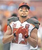  ?? CLIFF MCBRIDE/ GETTY IMAGES ?? “Vincent casted a bigger shadow after his career than he did during his career, when it comes to our community,” former business partner Mario Frias says of Vincent Jackson.