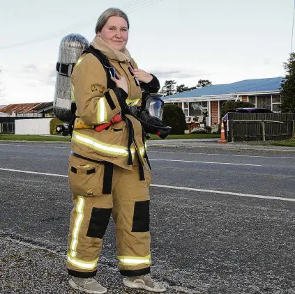  ?? PHOTO: MICHAEL CURREEN ?? Stepping up . . . Raising money and awareness for prostate cancer is Wyndham fire brigade member Kailey Yeoman, who is walking the streets of her town each day this month in her firefighti­ng gear.