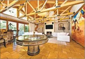  ??  ?? BEAMED CEILINGS are among the design features, which strike a balance between rustic casual and contempora­ry flair.