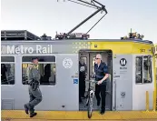  ??  ?? The trains of the Metro Expo Line, left, now go all the way to the beach at Santa Monica, right; Casa del mar, below