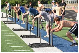  ?? PHOTOS BY STACI VANDAGRIFF/THREE RIVERS EDITION ?? Players for the Southside Batesville football team prepare to push sleds during a recent practice. Southside Batesville finished 7-4 overall and 5-2 in conference last year.