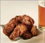  ?? Tribune News Servie ?? Stout mustard wings.