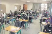  ?? Picture: ALLAN WEBSTER ?? MASKED CLASSES: Stirling High School Grade 12's get back to learning in East London as schools across the province reopen.