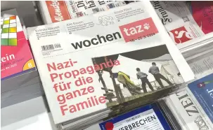  ?? (Aaron Poris) ?? GERMANY’S WOCHEN Taz’s headline story reads “Nazi Propaganda for the Whole Family”