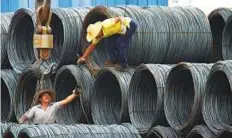  ?? AP ?? ■ The steel market in Yichang, Hubei province, China. The White House plans to impose tariffs worth as much as $60 billion on Chinese products as soon as this week.