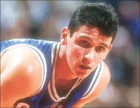  ?? Mitchell Layton / Getty Images ?? Seton Hall’s Danny Hurley during a break in the action against Georgetown in 1993. Hurley is now UConn’s head coach and faces his alam mater on Saturday.