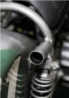  ??  ?? ABOVE: Exhaust pipe exits down the frame tube