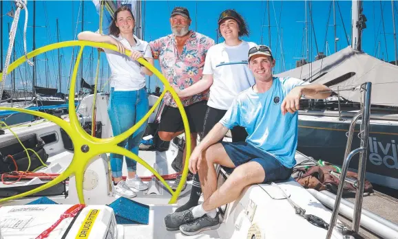  ?? Picture: Justin Lloyd ?? Richard Grimes and his children Rebecca, Jess and Tom are fortunate to still be able to compete in the Sydney to Hobart.