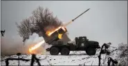  ?? AP PHOTO/VADIM GHIRDA ?? Ukrainian military fires from a multiple rocket launcher at Russian positions in the Kharkiv area, Ukraine, Saturday, Feb. 25, 2023.