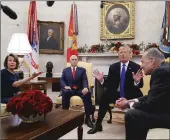  ?? Getty Images/tns ?? President Donald Trump argues about border security with Senate Minority Leader Chuck Schumer, (D-NY), and House Minority Leader Nancy Pelosi, (D-CA), as Vice President Mike Pence sits nearby in the Oval Office on Dec. 11 in Washington, DC.