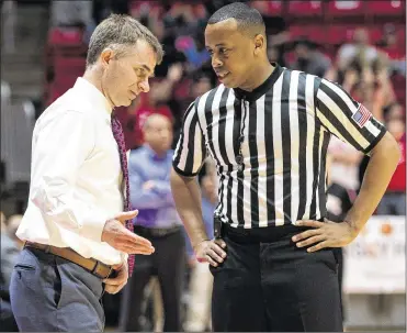  ?? CONTRIBUTE­D BY DOMENIC CENTOFANTI / BALL STATE CREATIVE SERVICES ?? Ball State coach James Whitford wants an explanatio­n from Edwin Young during Friday’s game. It was Young’s fifth game in seven days, and he’s booked again this week.