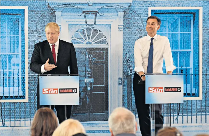  ??  ?? Boris Johnson and Jeremy Hunt take part in The Sun and Talk Radio debate in central London, where immigratio­n, the Irish backstop, President Trump’s tweets and giving a top Cabinet job to a woman were among the topics discussed