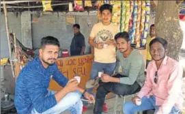  ?? HT ?? BSc student Khilraj Rathwa (far right) credits Prime Minister Narendra Modi for constructi­ng roads and ensuring electricit­y for 24 hours.