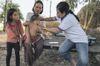  ??  ?? Operation Asha, left, has developed a treatment programme across India, Cambodia and Afghanista­n, serving 16 million patients and giving disadvanta­ged people jobs as health workers