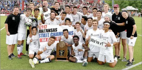  ?? Bud Sullins/Special to the Herald-Leader ?? The Siloam Springs boys soccer team poses for a photo just minutes after defeating Mountain Home 4-0 in the Class 6A state finals at Razorback Field in Fayettevil­le. It was the second straight state title and fourth overall for the Panthers.
