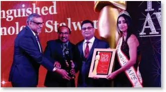  ??  ?? Debasish Bhowmik, Senior Vice President, received the award for Best Hospitalit­y Profession­al in a Tourist Destinatio­n