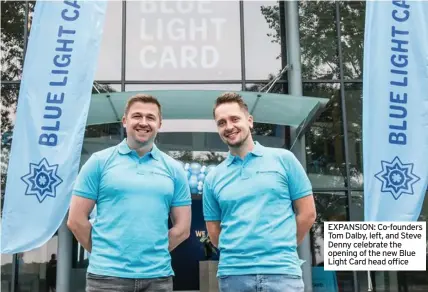  ??  ?? EXPANSION: Co-founders Tom Dalby, left, and Steve Denny celebrate the opening of the new Blue Light Card head office