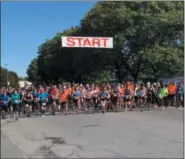  ??  ?? People get ready to begin the 5K race during the Arsenal City Run in Watervliet on Sunday.