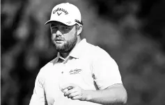  ?? - AFP photo ?? Marc Leishman of Australia reacts on the 12th green during the first round of the Quicken Loans National on June 29, 2017 TPC Potomac in Potomac, Maryland.