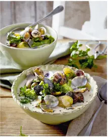  ??  ?? Serves 4 1kg clams, cleaned 800g new potatoes 1 lemon 500ml whole milk 1 clove of garlic 1 bay leaf sea salt and black pepper 1 red onion 200g tenderstem broccoli 2 tbsp cornflour 2 tbsp single cream 3 tbsp roughly chopped flat-leaf parsley