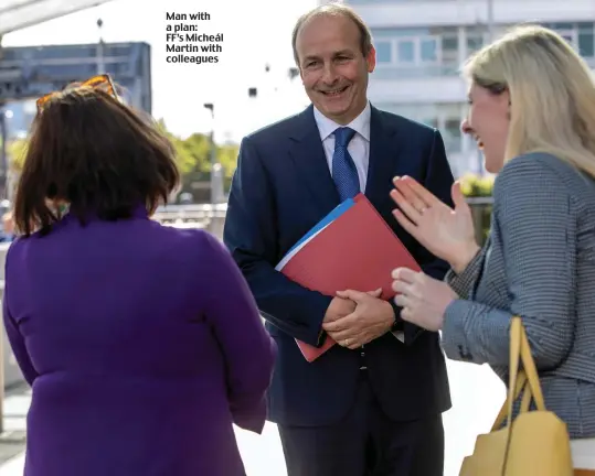  ??  ?? Man with a plan: FF’s Micheál Martin with colleagues