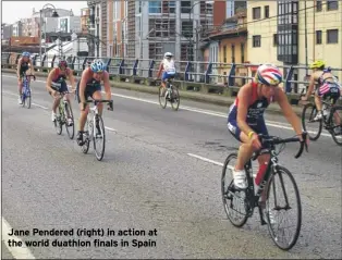  ??  ?? Jane Pendered (right) in action at the world duathlon finals in Spain