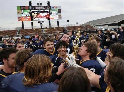  ?? PAUL DICICCO — FOR THE NEWS-HERALD ?? Kirtland celebrates after defeating Ironton to win the Division V state championsh­ip in Massillon.