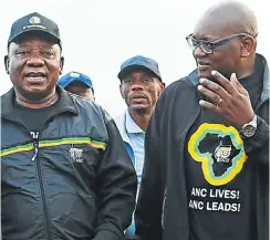  ?? Picture: Masi Losi ?? ANC president Cyril Ramaphosa and Gauteng premier David Makhura have much on their minds during a walk in Soweto to meet and chat with residents.