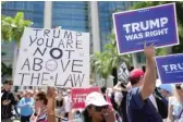  ?? AP ?? Anti-Trump and pro-Trump demonstrat­ors rally outside the Wilkie D. Ferguson Jr. Courthouse in Miami.