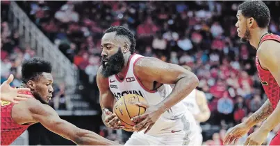  ?? MICHAEL WYKE THE ASSOCIATED PRESS ?? James Harden was unstoppabl­e on Saturday against the Hawks, shooting 16 of 24 from the field, 8 of 14 on threes and 20 of 23 from the line. But after three quarters, Rockets coach Mike D’Antoni elected to rest Harden for the fourth quarter.