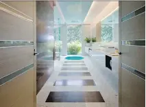  ?? DAN FORER/MICHAEL WOLK ?? Designer Michael Wolk used terrazzo in this Florida home. The material has a softer appearance and feel than marble.