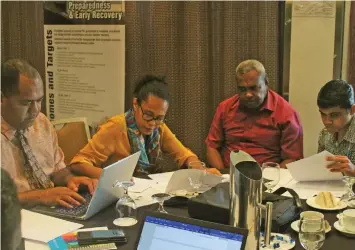  ?? Photo: UNDP ?? Participan­ts at the country preparedne­ss package meeting.