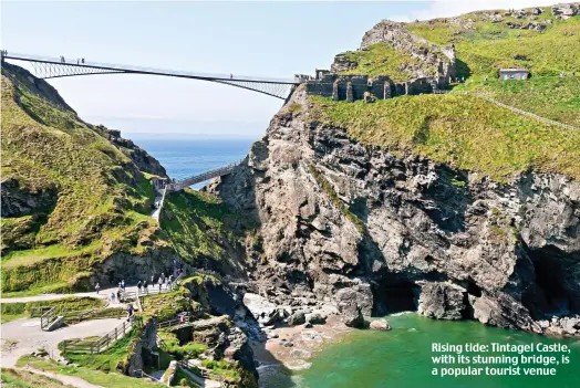  ?? ?? Rising tide: Tintagel Castle, with its stunning bridge, is a popular tourist venue