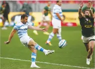  ??  ?? Under pressure: Cobus Reinach attempts a chargedown on Nicolas Sanchez’s clearance