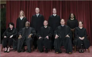  ?? J. SCOTT APPLEWHITE — THE ASSOCIATED PRESS ?? Members of the Supreme Court sit for a new group portrait following the addition of Associate Justice Ketanji Brown Jackson, at the Supreme Court building in Washington in October 2022.