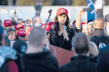  ?? STEFANI REYNOLDS/THE NEW YORK TIMES ?? Rep. Lauren Boebert, R-Colo., speaks to supporters of President Donald Trump outside the U.S. Supreme Court during a rally last month to protest the results of the 2020 presidenti­al election.