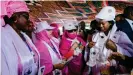  ??  ?? Nina Amu Dafa Kan (left), Mauritania­n Minister for Social Affairs, Childhood and Family, on Internatio­nal Women's Day, 8 March 2020