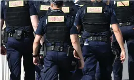  ?? Photograph: Darren England/AAP ?? Queensland police officers who receive a jail sentence for a crime will be ‘immediatel­y dismissed’ under the proposed legislatio­n.