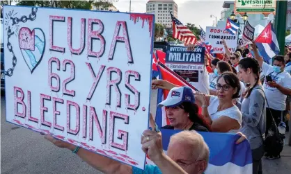  ?? Photograph: Cristóbal Herrera/EPA ?? Cuban Americans participat­e in a demonstrat­ion to show support for protesters in Cuba, in frontof the Versailles restaurant in Miami on Wednesday.