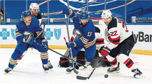  ?? JOHN CROUCH GETTY IMAGES ?? The Devils’ Ryan Murray against the Sabres on Jan. 30. The Sabres had no players on the COVID-19 list then. They have four now, while the Devils have 16.