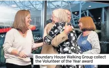  ??  ?? Boundary House Walking Group collect the Volunteer of the Year award