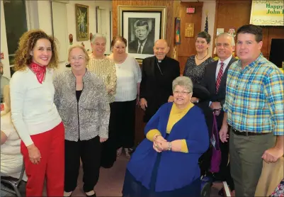  ?? Photo by Joseph B. Nadeau ?? Residents of Kennedy Manor celebrated the 10-story Woonsocket Housing Authority residentia­l complex’ 50th Anniversar­y on Saturday with a dinner in the manor’s community room. From left are Mayor Lisa Baldelli-Hunt, Debra Ducharme, Betsy Peloquin, both...